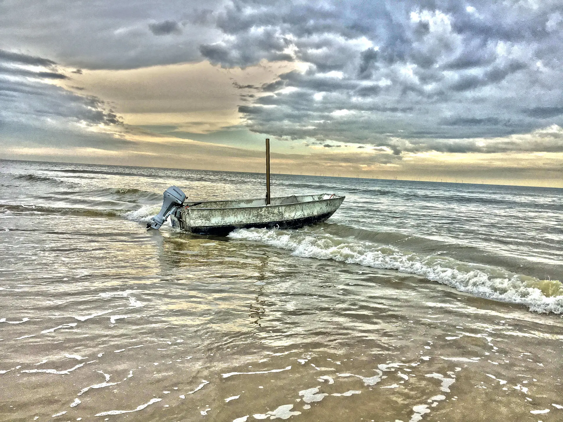 The lonely boat on the beach